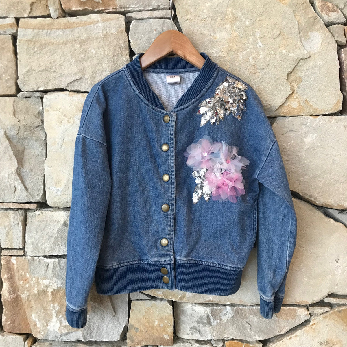 Denim jacket with sequinned leaves and tulle flower detail - size 5