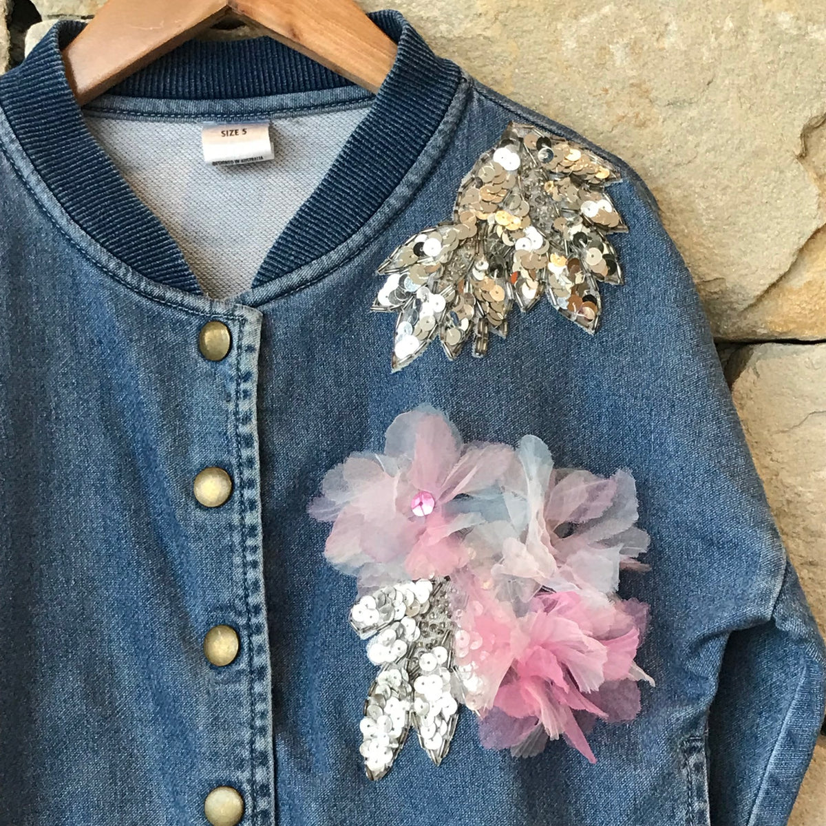 Denim jacket with sequinned leaves and tulle flower detail - size 5