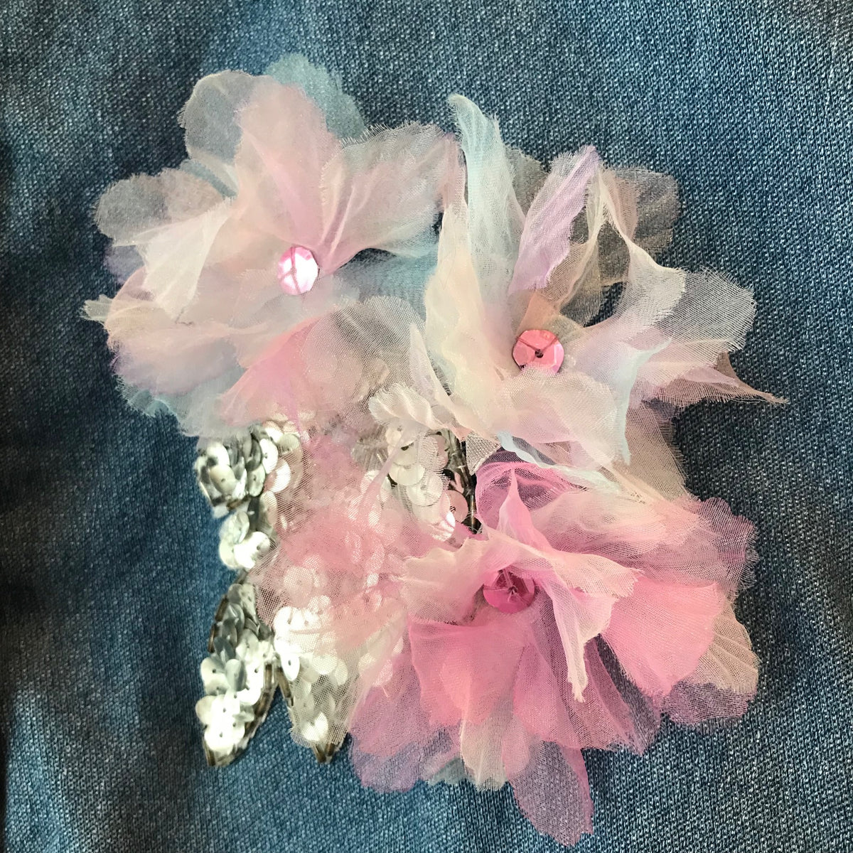 Denim jacket with sequinned leaves and tulle flower detail - size 5