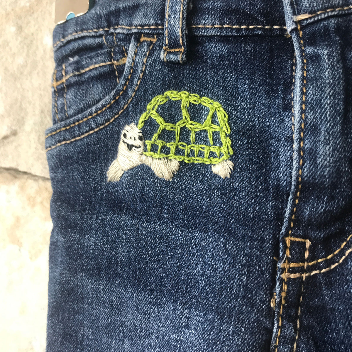 Denim shorts with embroidered turtle - size 1